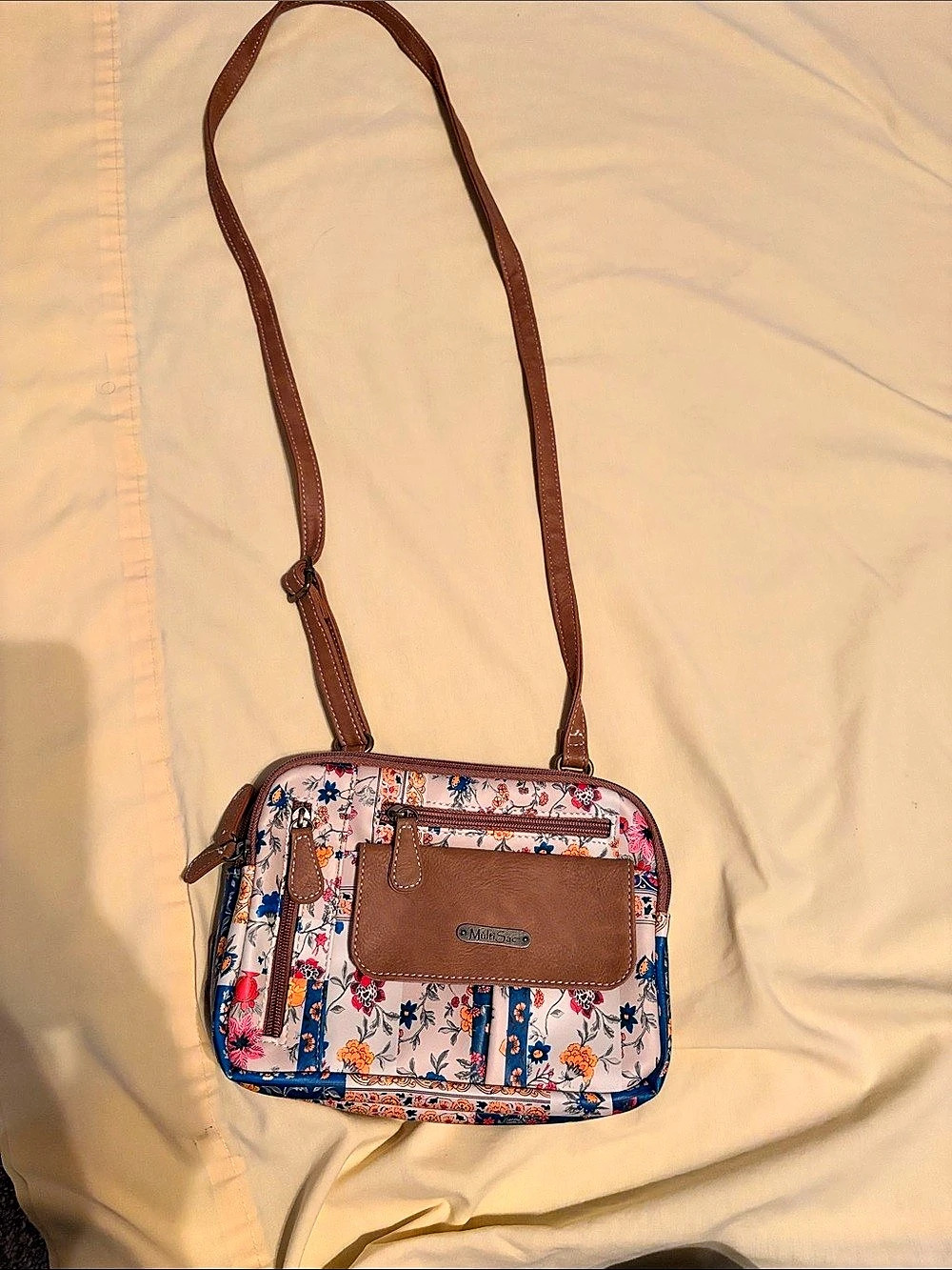 The Sak Crossbody Bag in Multicolor with many pockets